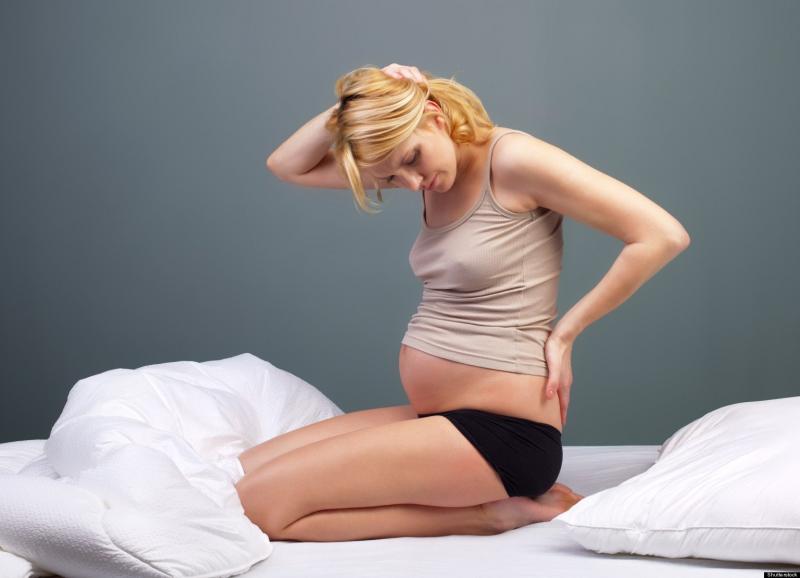 Боли в копчике во время беременности