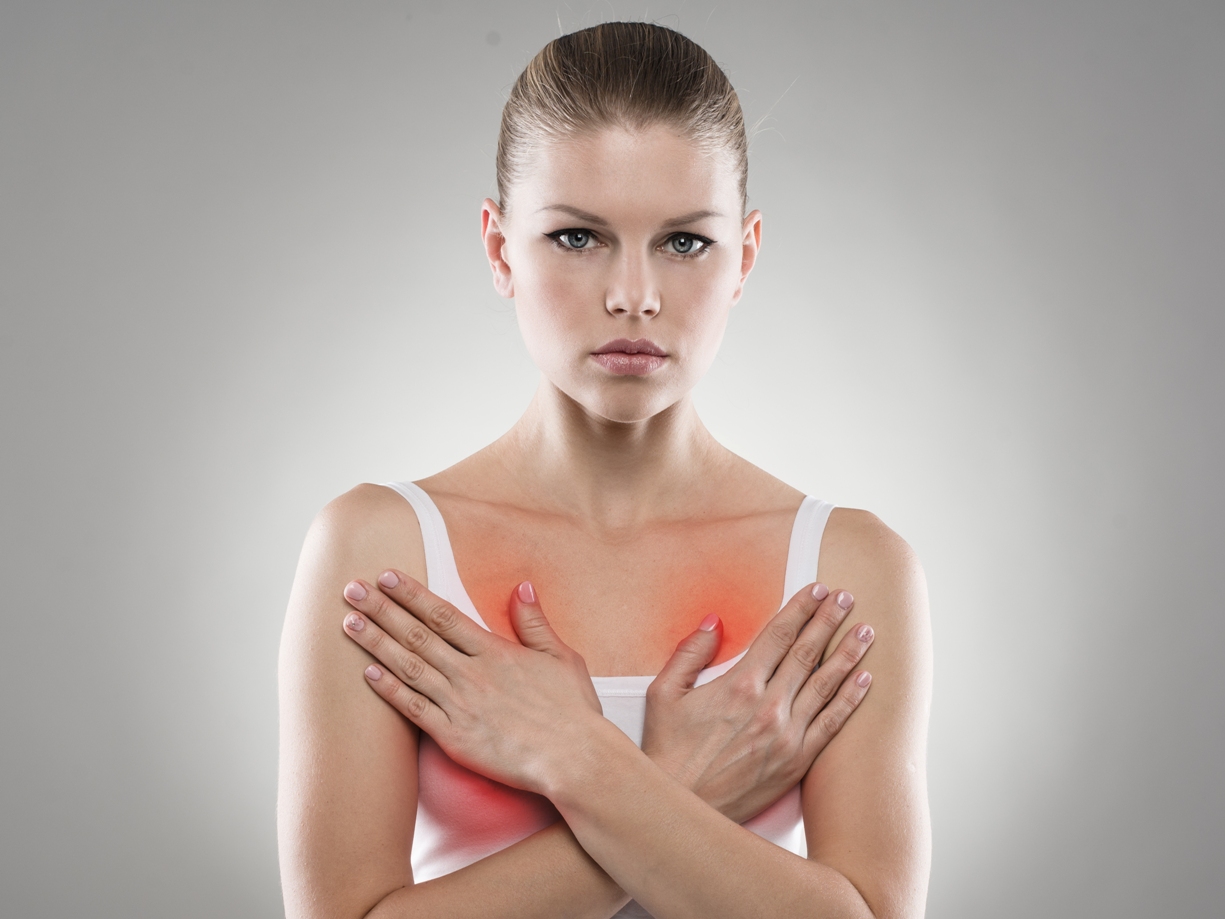 Боль в груди во время и после овуляции: норма или патология