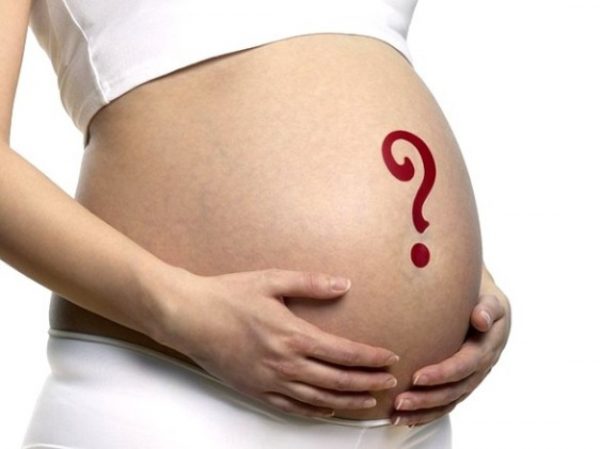 Знак вопроса на беременном животе