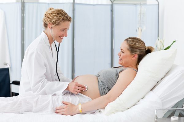 Беременная на приёме у врача